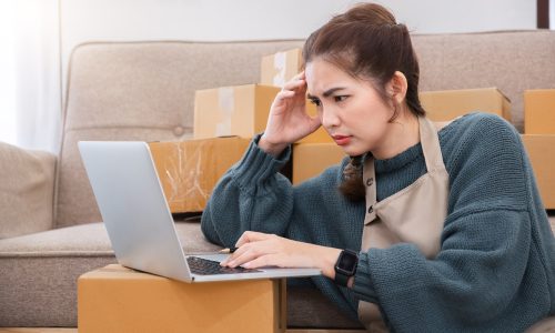 Small Business, Startup SME, Owner Entrepreneurs. Asian woman with unsuccess business online